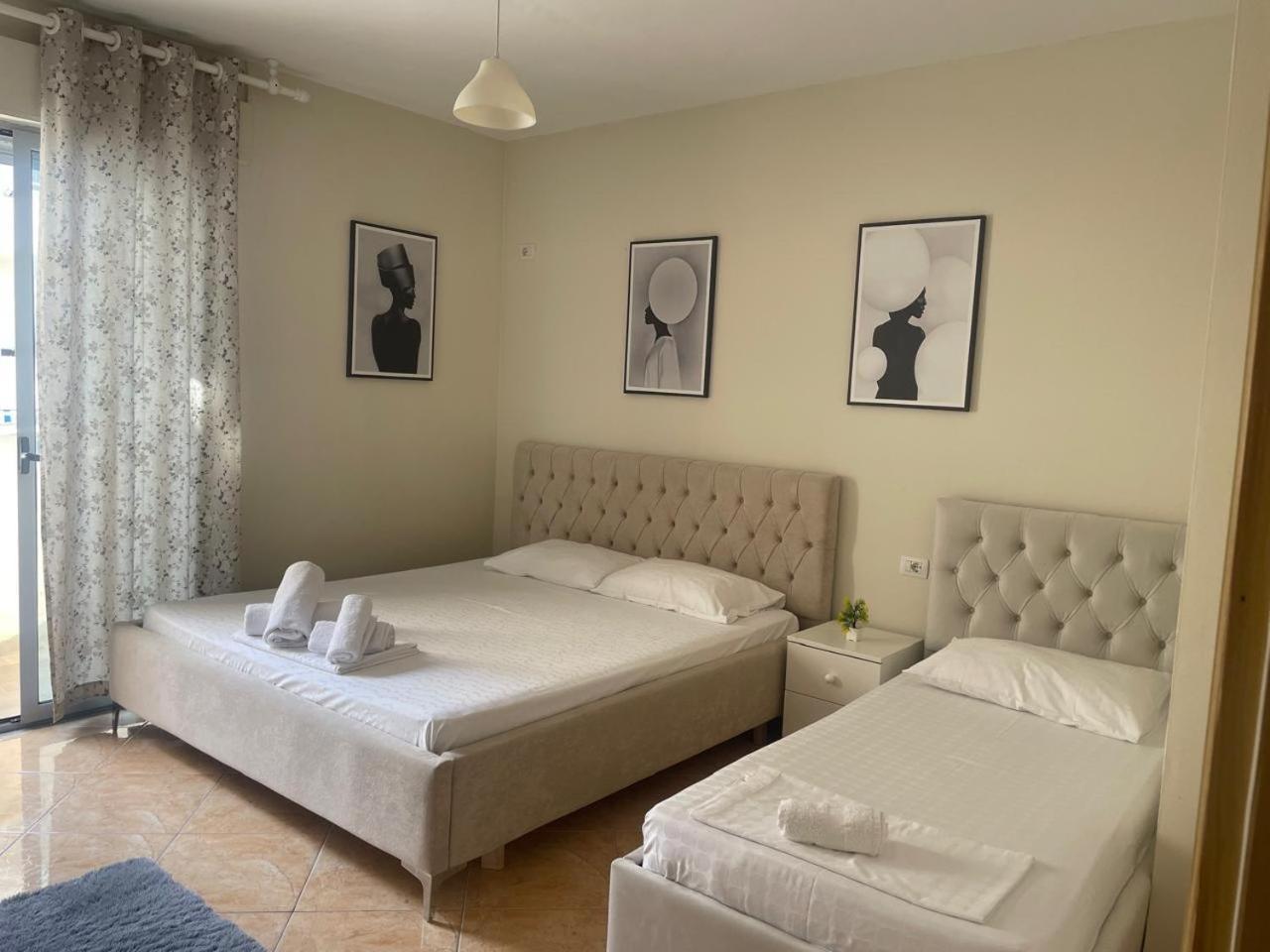 Maison Apartments Vlorë Quarto foto